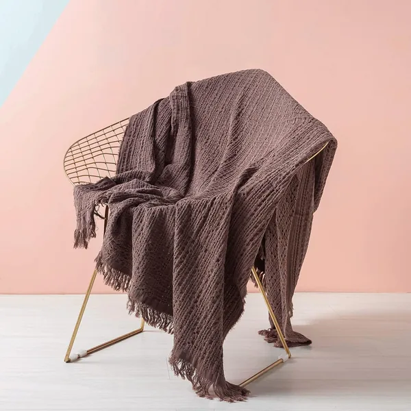Simple and Opulence waffle weave cotton throw with tassels in brown rust